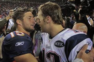 Tim Tebow and Tom Brady share a moment.
